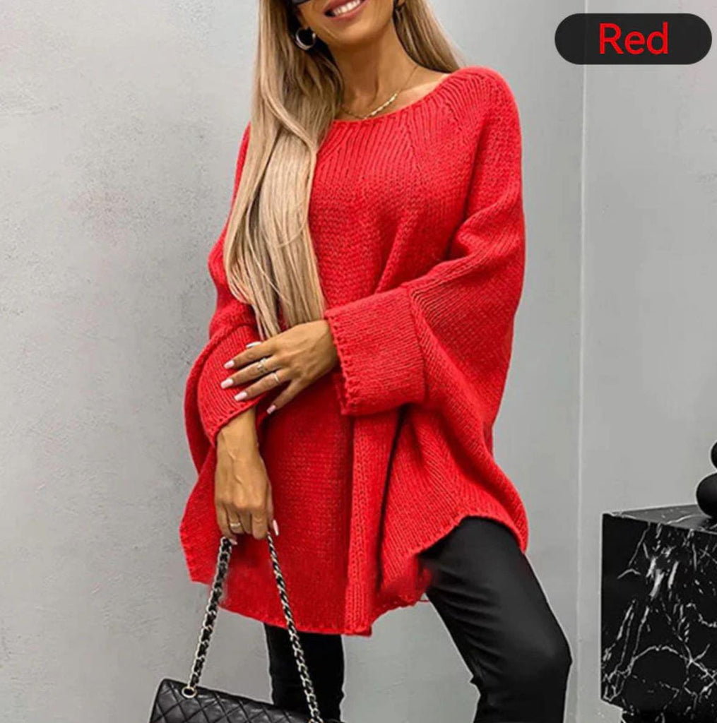 Elegant women's knitted sweater with cape