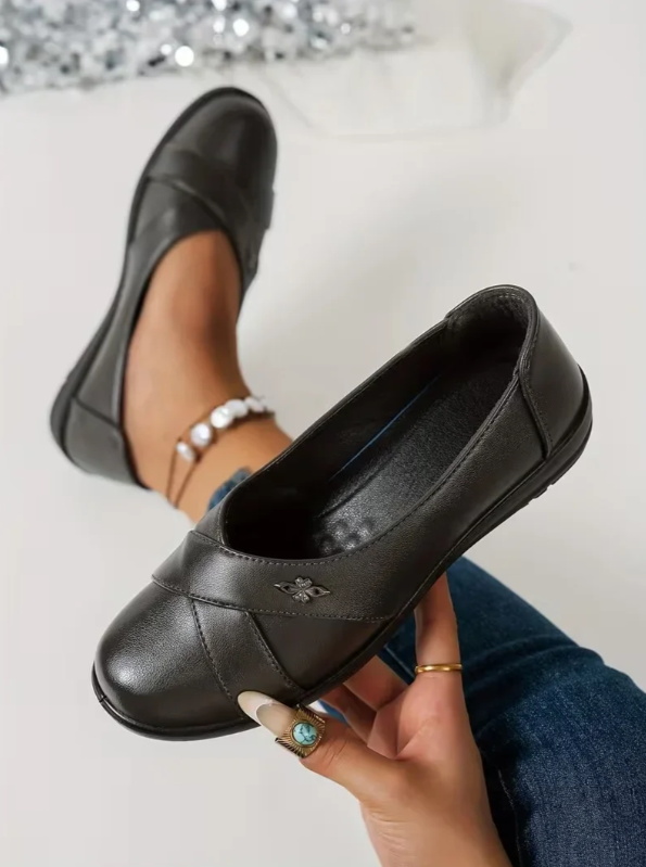 Women’s Leather Orthopaedic Slip On Shoes With Metal Emblem