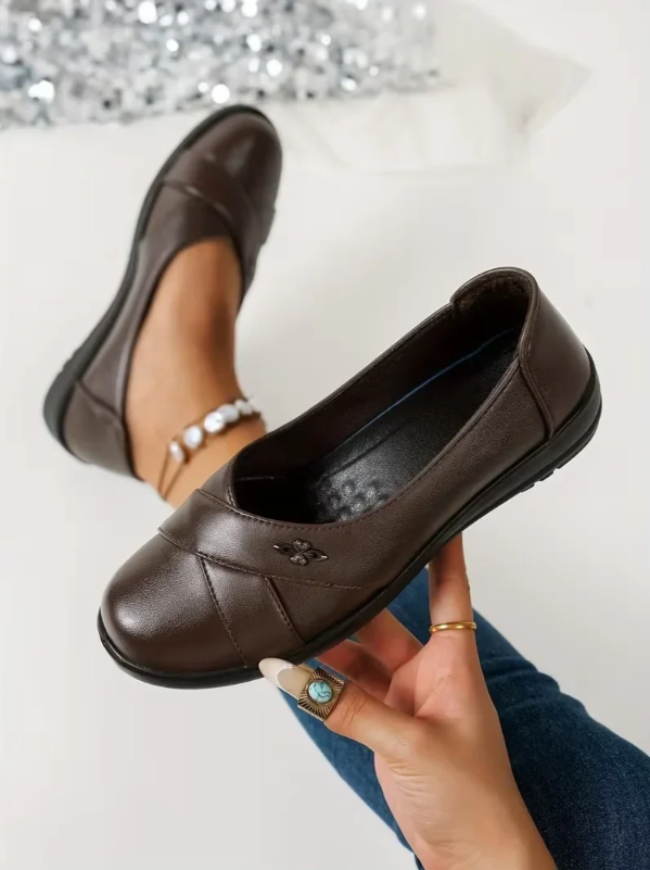 Women’s Leather Orthopaedic Slip On Shoes With Metal Emblem