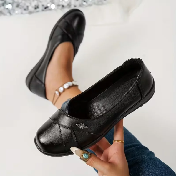 Women’s Leather Orthopaedic Slip On Shoes With Metal Emblem