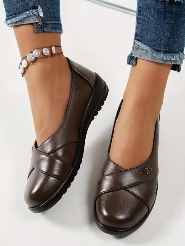 Women’s Leather Orthopaedic Slip On Shoes With Metal Emblem