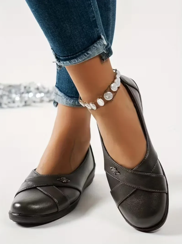 Women’s Leather Orthopaedic Slip On Shoes With Metal Emblem