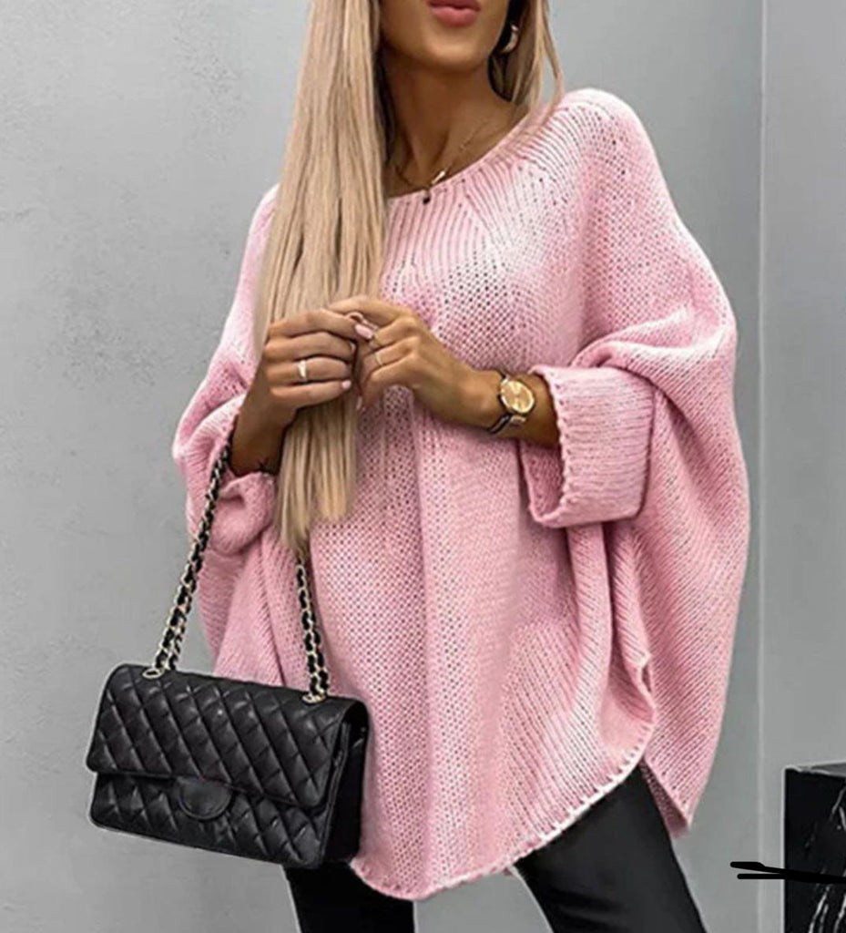 Elegant women's knitted sweater with cape