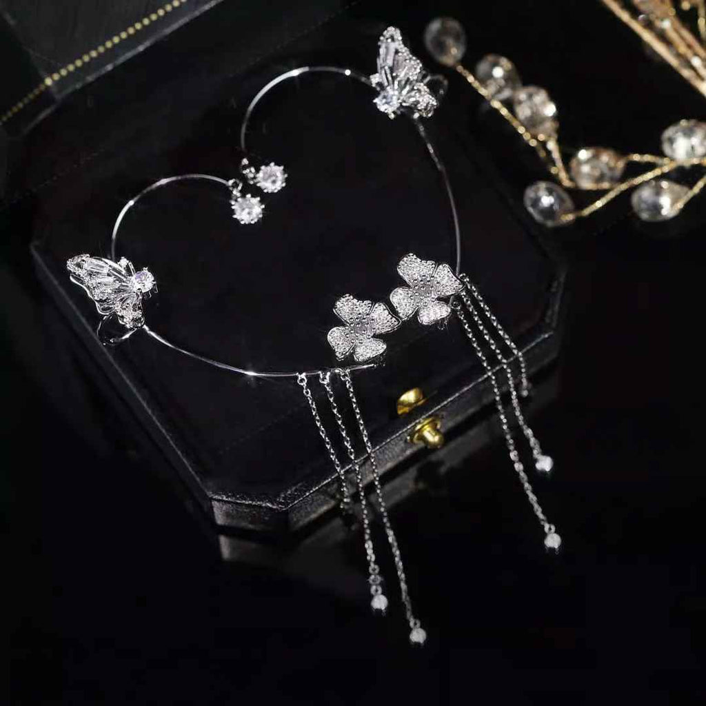 Boucles d'oreilles pendantes papillon à pompon et zircon
